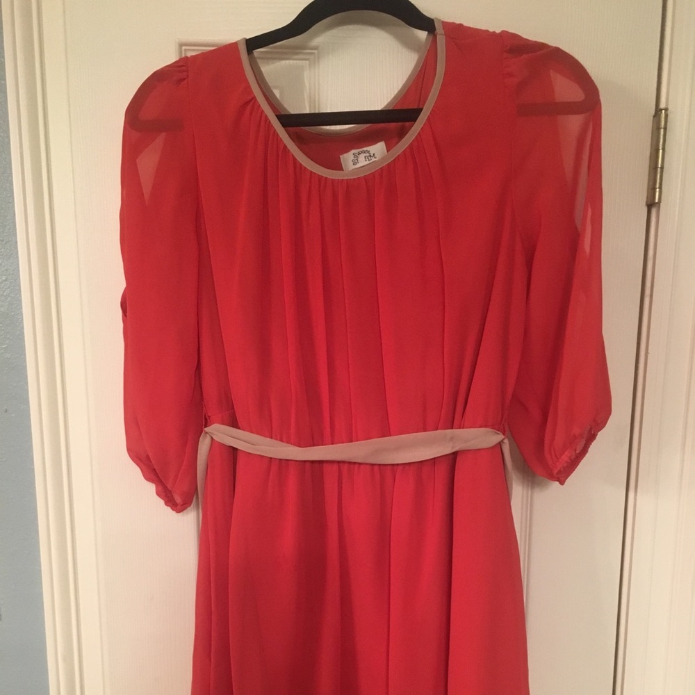 Orange sleeved dress